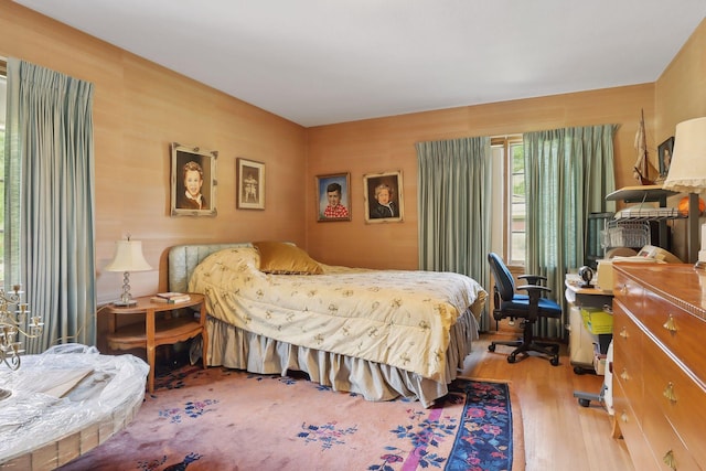 bedroom featuring light wood-type flooring