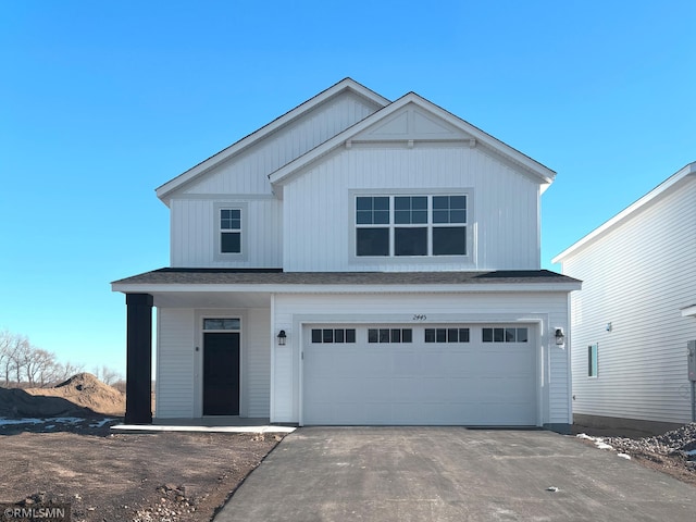 view of front of property featuring a garage