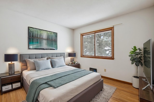 bedroom featuring light hardwood / wood-style floors