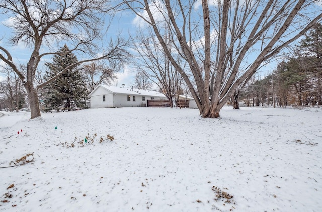 view of yard covered in snow