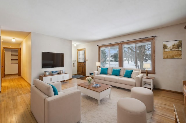 living room with light hardwood / wood-style floors