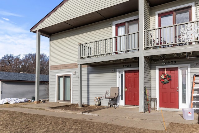 property entrance with a balcony