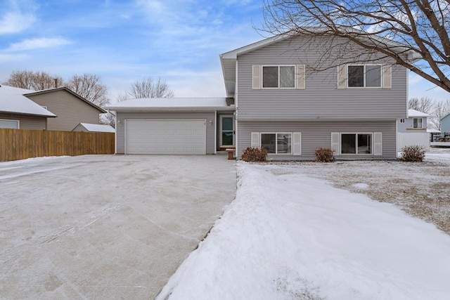 view of front of property with a garage