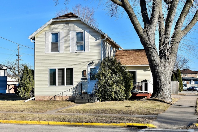 view of front property with a front lawn