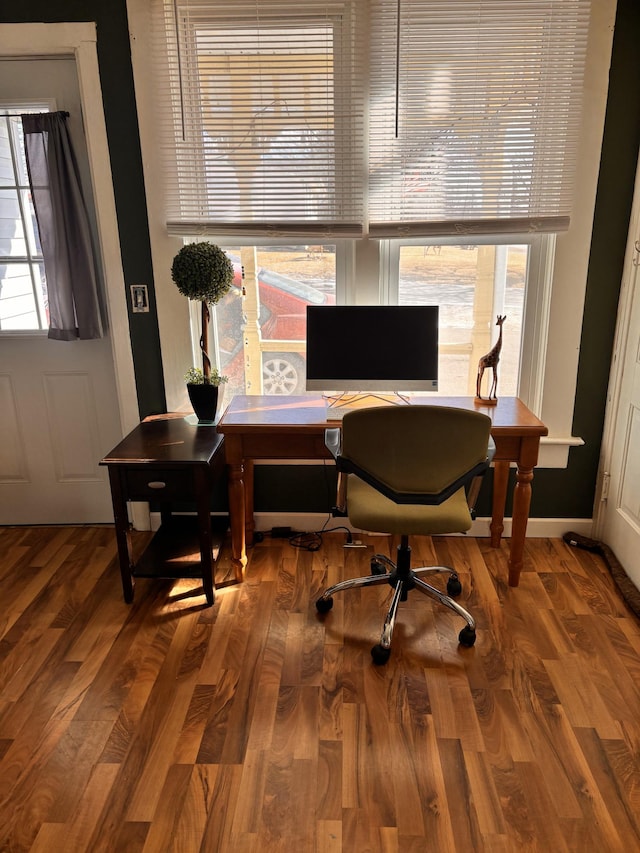 office space with a wealth of natural light and wood finished floors