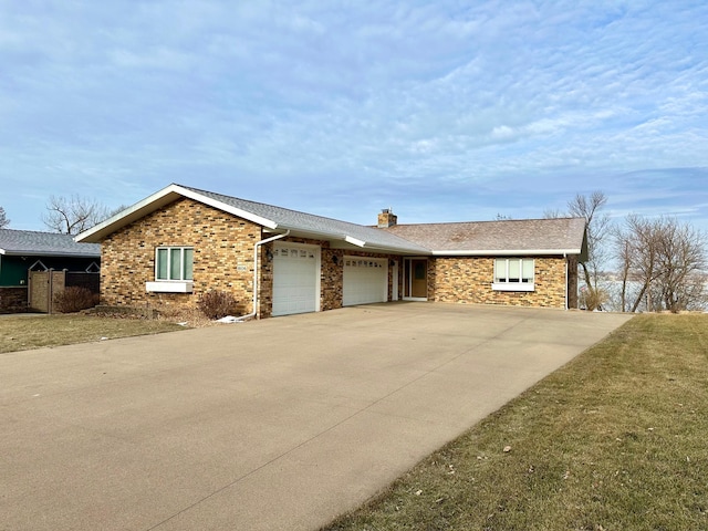 ranch-style home featuring a garage