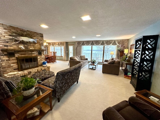 living room with a fireplace, carpet, and a textured ceiling