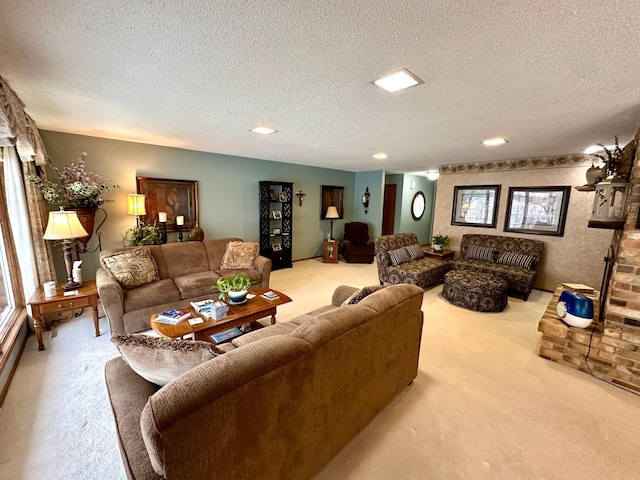 living room featuring a textured ceiling, light colored carpet, and a wealth of natural light