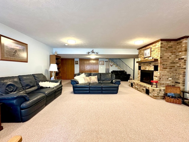 living room featuring a textured ceiling, carpet floors, and a brick fireplace