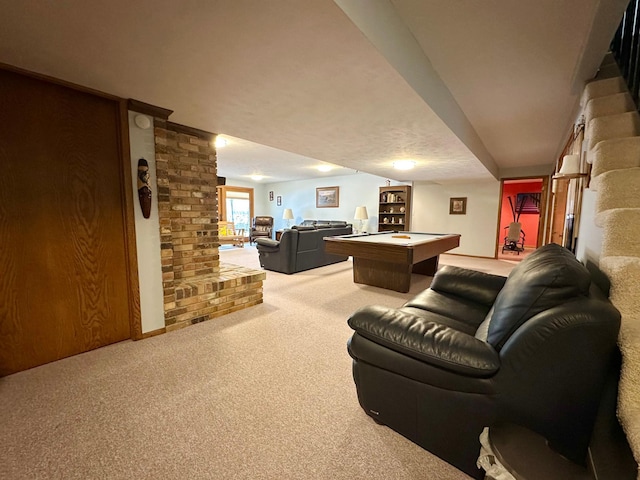 carpeted living room with pool table