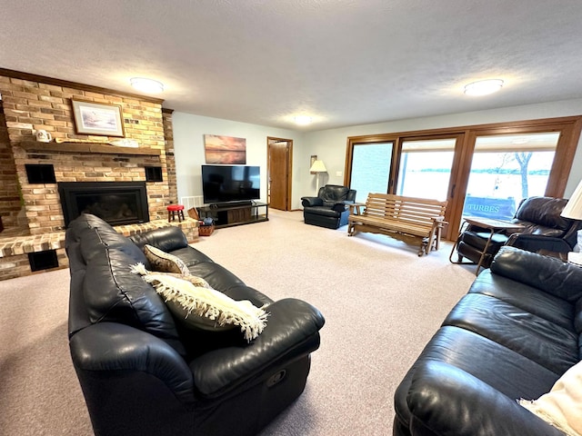 carpeted living room featuring a textured ceiling and a brick fireplace