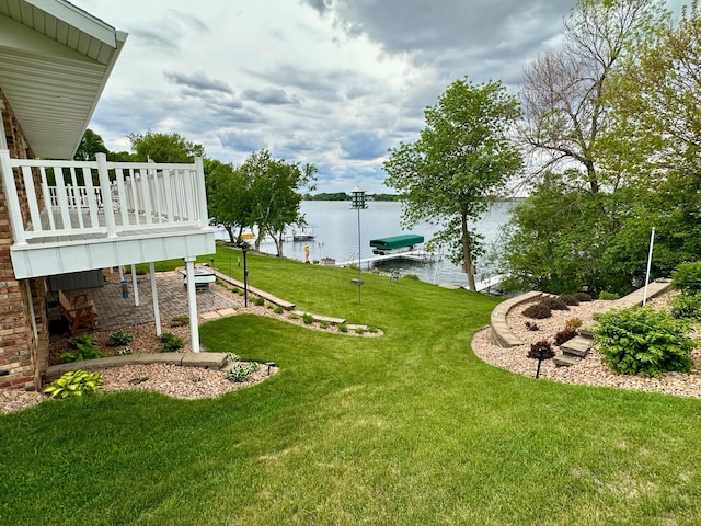 1606 Shore Dr, Worthington, MN 56187 - view of green lawn with a water view