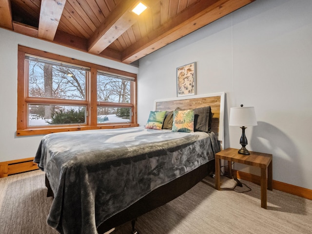 bedroom with beamed ceiling, light colored carpet, wooden ceiling, and baseboard heating