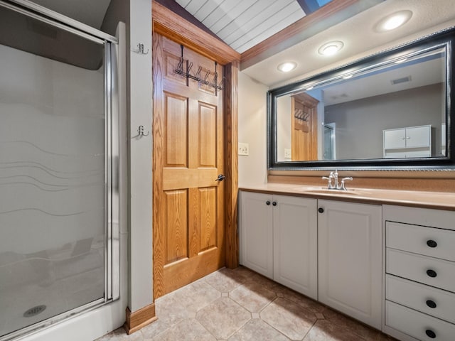 full bath featuring recessed lighting, a shower stall, visible vents, and vanity