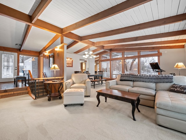 living room featuring a notable chandelier, carpet floors, and vaulted ceiling with beams