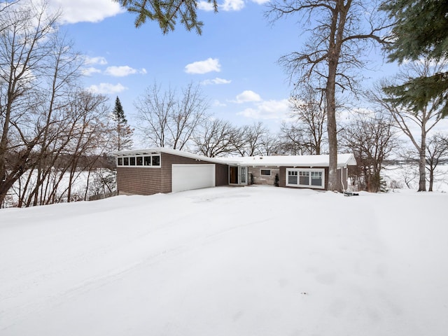 view of front of property featuring an attached garage