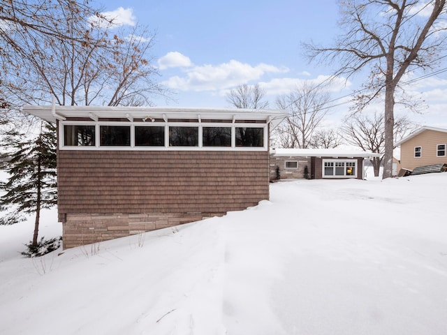 view of snow covered property