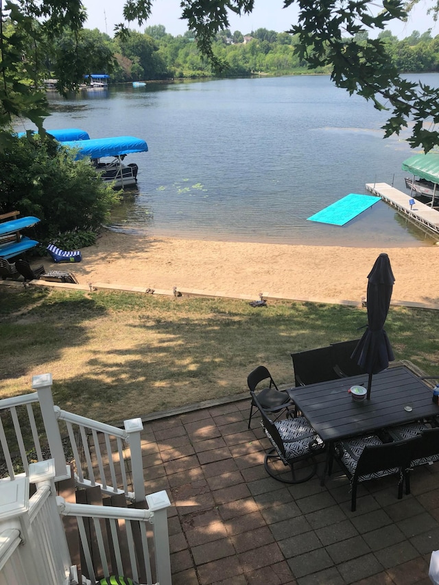 view of water feature with a dock