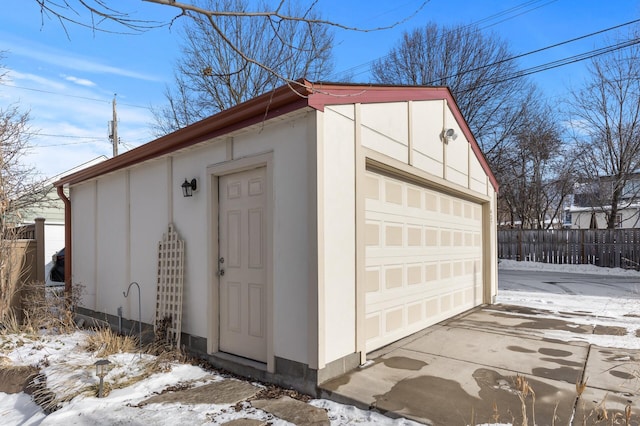 view of snow covered garage