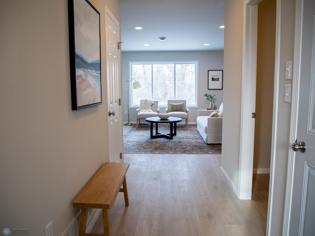 hallway with light wood-type flooring