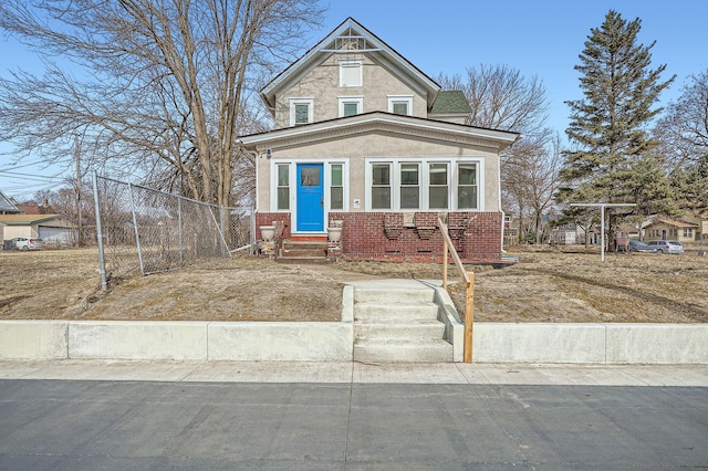 723 Lowry Ave NE, Minneapolis, MN 55418 - view of front of property with entry steps, brick siding, and stucco siding