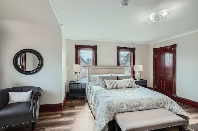 723 Lowry Ave NE, Minneapolis, MN 55418 - bedroom with baseboards, ornamental molding, and wood finished floors