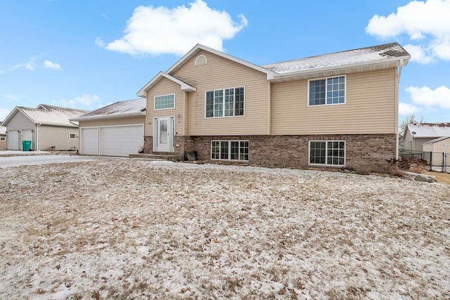 split foyer home featuring a garage