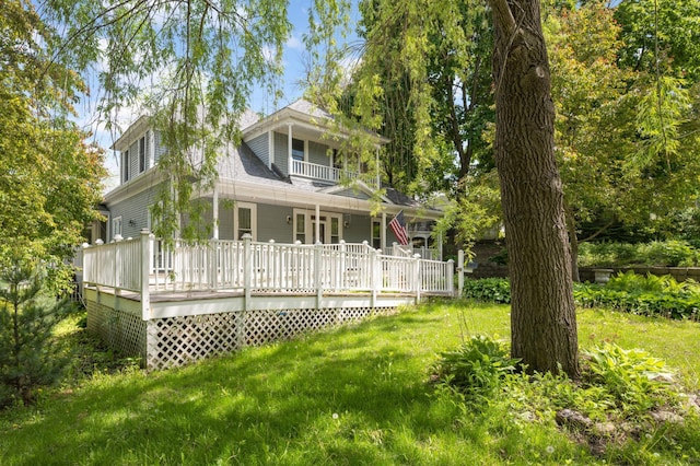 451 Everett St N, Stillwater, MN 55082 - rear view of property with a lawn and a balcony