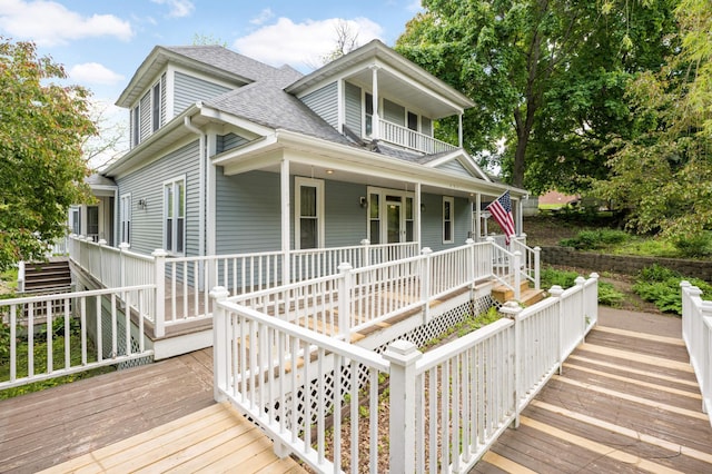 451 Everett St N, Stillwater, MN 55082 - view of front of property featuring a shingled roof, covered porch, and stairs