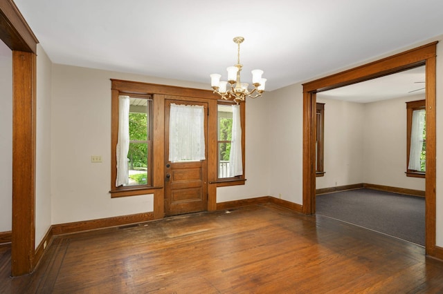 451 Everett St N, Stillwater, MN 55082 - unfurnished room with a chandelier, plenty of natural light, and baseboards