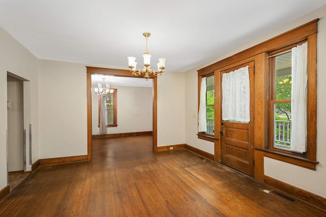 451 Everett St N, Stillwater, MN 55082 - entryway featuring a chandelier, baseboards, wood finished floors, and plenty of natural light