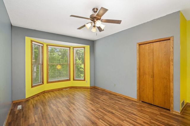 451 Everett St N, Stillwater, MN 55082 - empty room with wood finished floors, ceiling fan, and baseboards