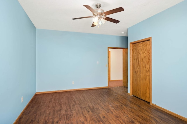 451 Everett St N, Stillwater, MN 55082 - unfurnished bedroom with wood finished floors, baseboards, ceiling fan, and a closet