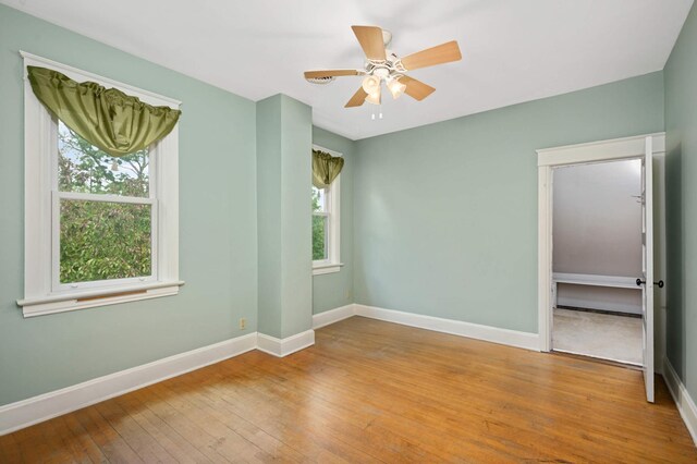 451 Everett St N, Stillwater, MN 55082 - empty room featuring baseboards, hardwood / wood-style floors, and a ceiling fan