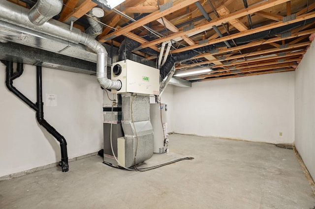 451 Everett St N, Stillwater, MN 55082 - unfinished below grade area featuring gas water heater and heating unit