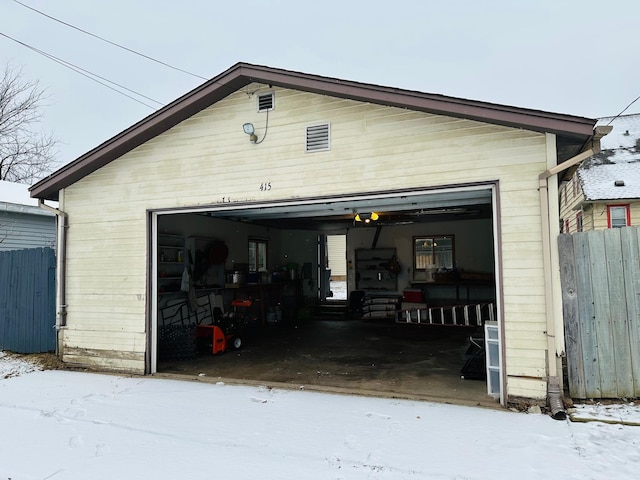 view of snow covered garage