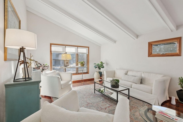 living room with vaulted ceiling with beams and hardwood / wood-style flooring