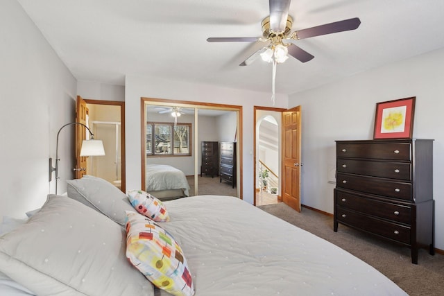 bedroom with ceiling fan, a closet, and dark colored carpet