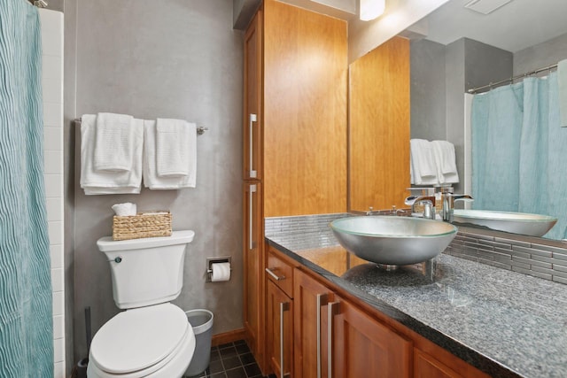 bathroom with vanity, tile patterned flooring, a shower with curtain, and toilet