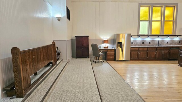 interior space featuring sink and light wood-type flooring