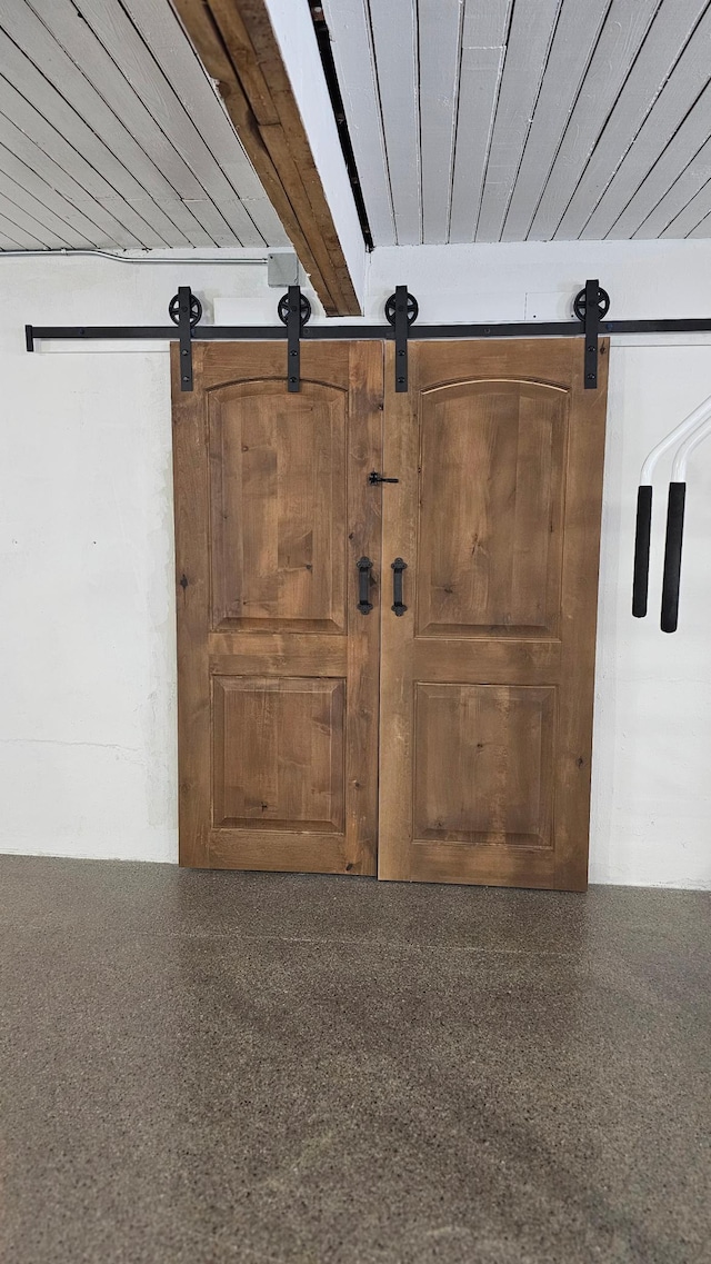 interior space featuring a barn door