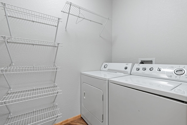 laundry area featuring separate washer and dryer