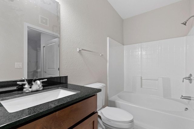 full bathroom with vanity, bathing tub / shower combination, and toilet