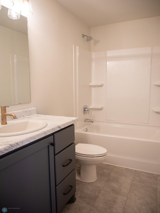 full bathroom featuring vanity, shower / bathing tub combination, and toilet