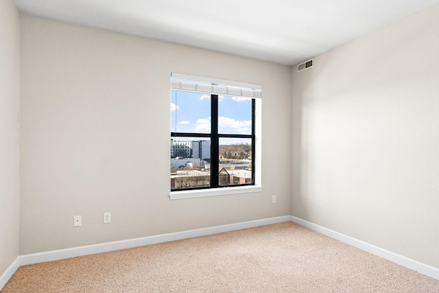 view of carpeted spare room