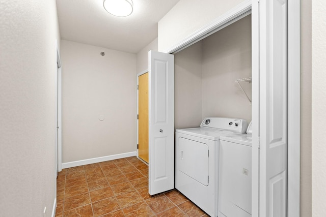 laundry room featuring washing machine and dryer