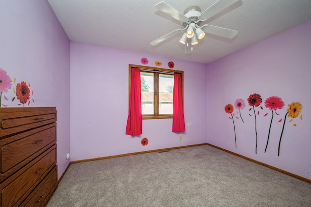 14962 Dodd Blvd, Rosemount, MN 55068 - unfurnished bedroom with light carpet, baseboards, and ceiling fan