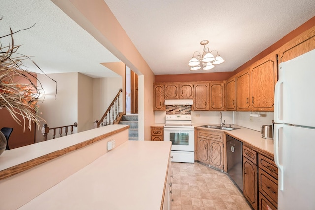 14962 Dodd Blvd, Rosemount, MN 55068 - kitchen with white appliances, under cabinet range hood, a sink, light countertops, and a chandelier