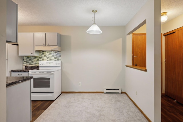 kitchen with backsplash, white appliances, a baseboard radiator, dark stone countertops, and hanging light fixtures