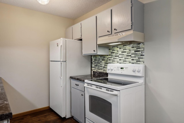 kitchen with tasteful backsplash, a textured ceiling, white appliances, dark wood-type flooring, and white cabinetry